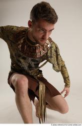 KEETA KNEELING POSE WITH SPEAR